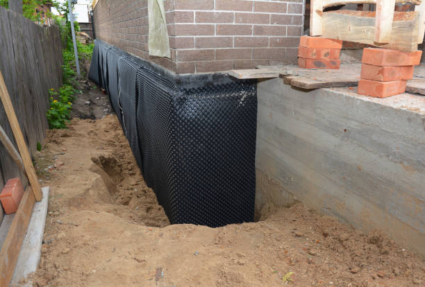 SJ Waterproofing Pros technician performing targeted Exterior Waterproofing assessment in Clayton, OH